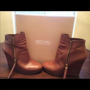 Authentic Michael Kors luggage booties.